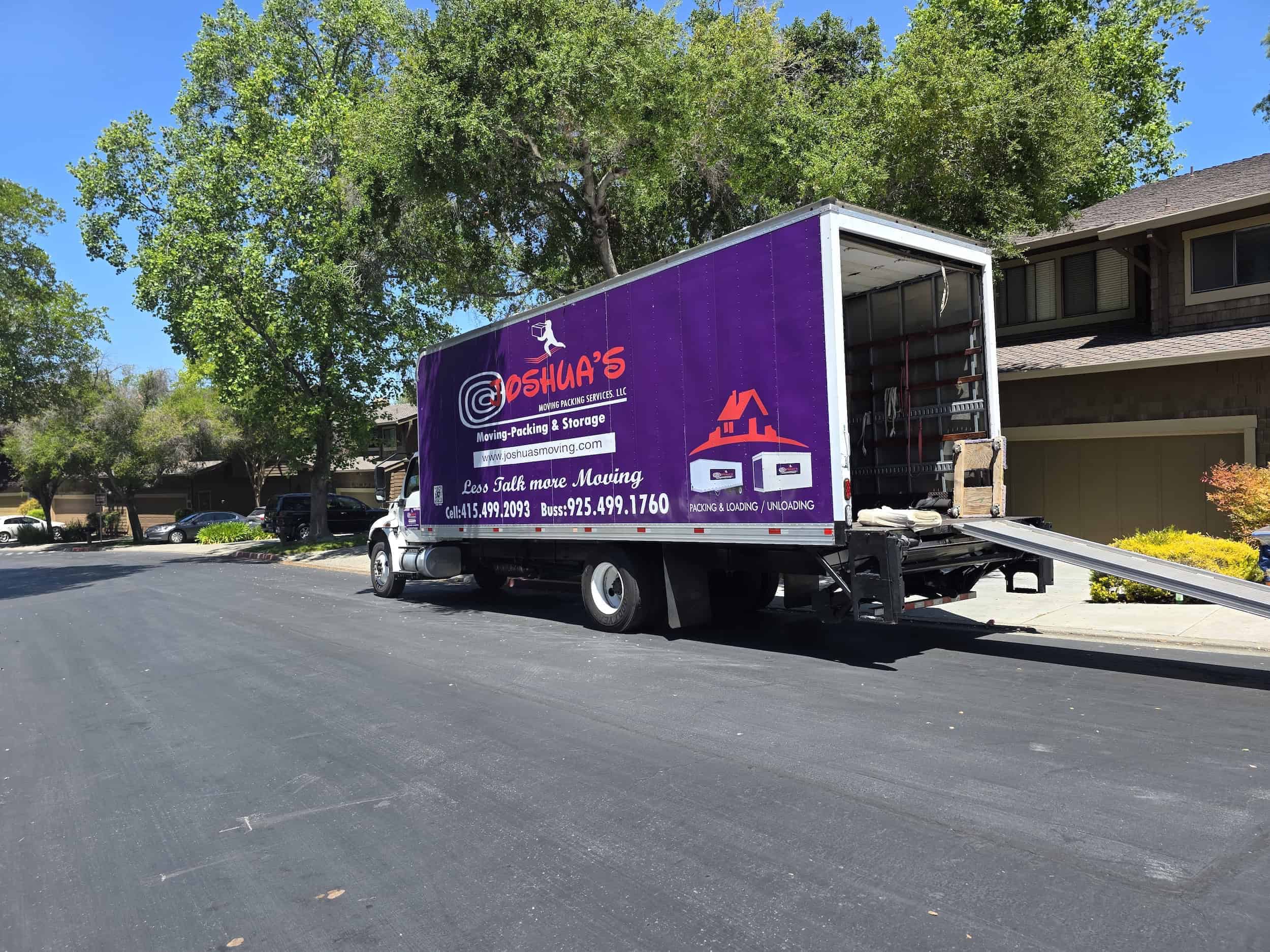 Moving trucks ready for a California intrastate relocation from San Carlos