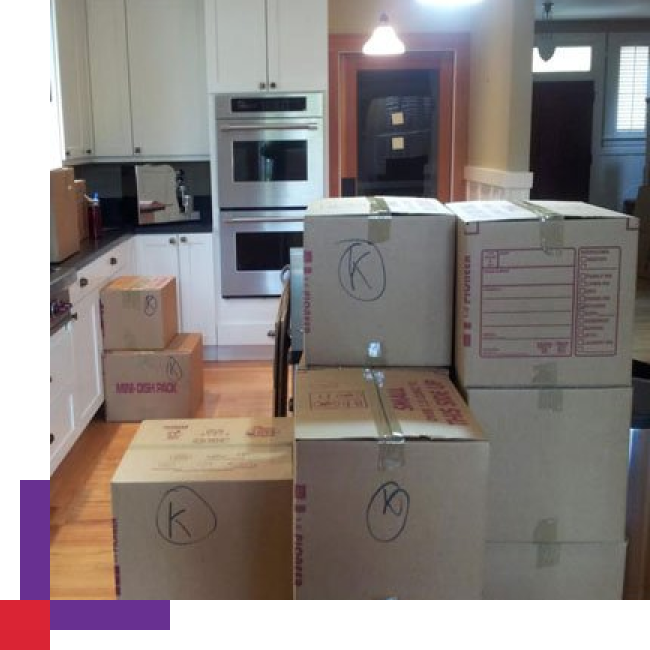 Professional packers carefully packing boxes for a San Carlos move