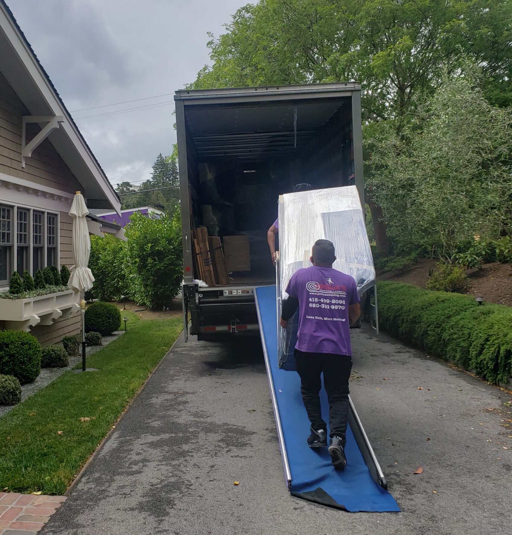 Residential moving team loading a truck in San Carlos