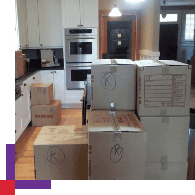 Student movers loading boxes for a Peninsula apartment move